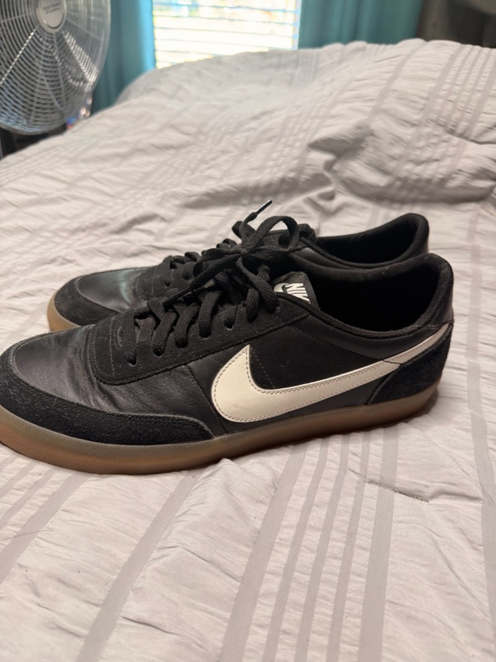 Nike Black Leather & Suede Sneakers with White Swoosh and Gum Sole